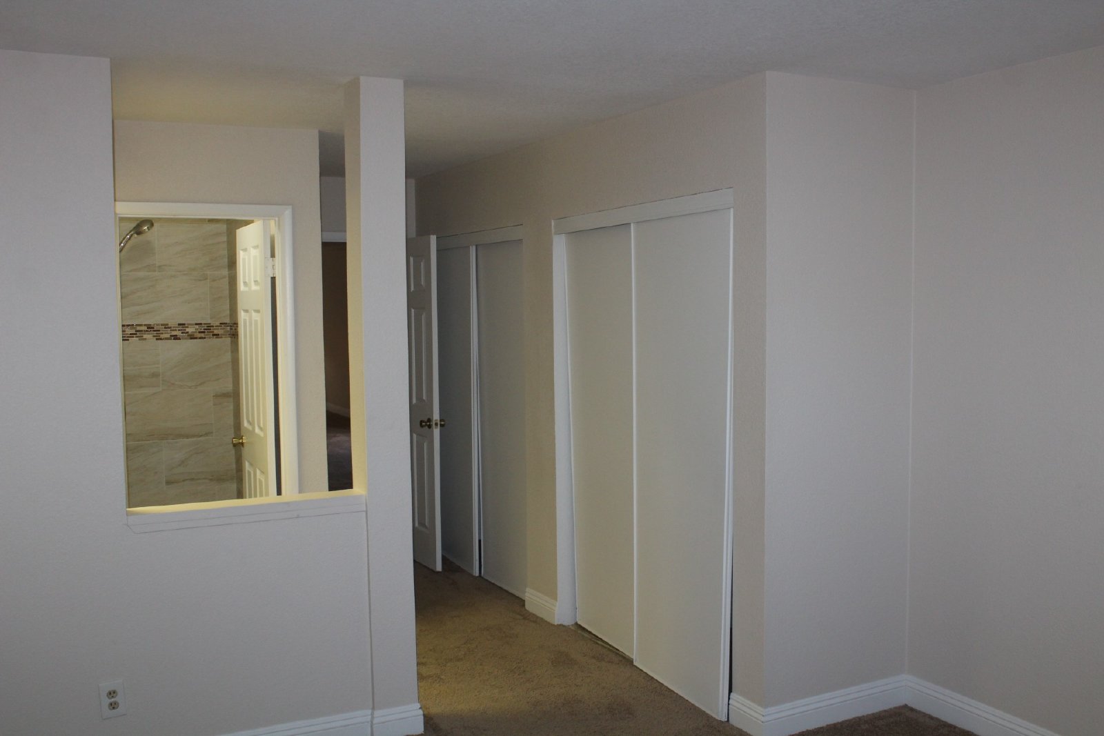 Single-story home with patio and garage property image